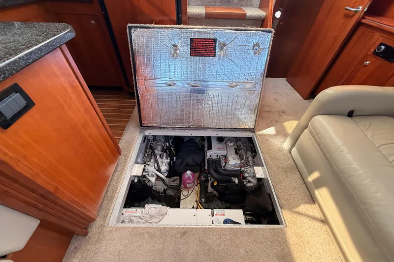 Slide: The Image of Engine compartment of 2005 Cruisers Yachts 405 Express Motoryacht, showcasing interior details. - 88
