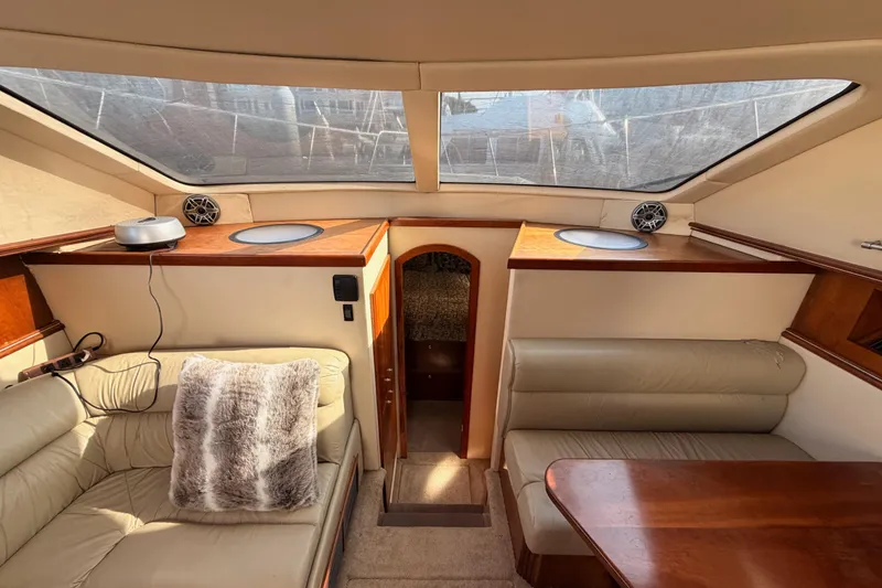 Slide: The Image of Luxurious interior of 2005 Cruisers Yachts 405 Express Motoryacht with plush seating and wood accents. - 50