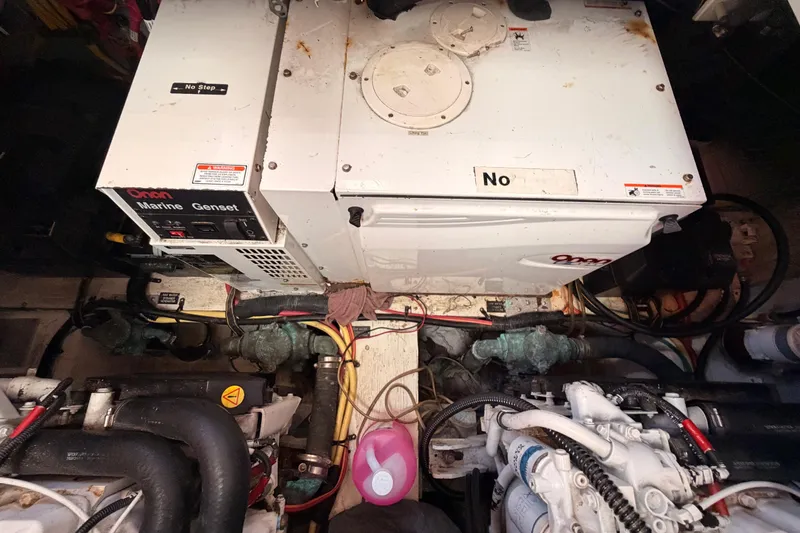 Slide: The Image of Engine room of 2005 Cruisers Yachts 405 Express Motoryacht with Onan marine generator. - 92