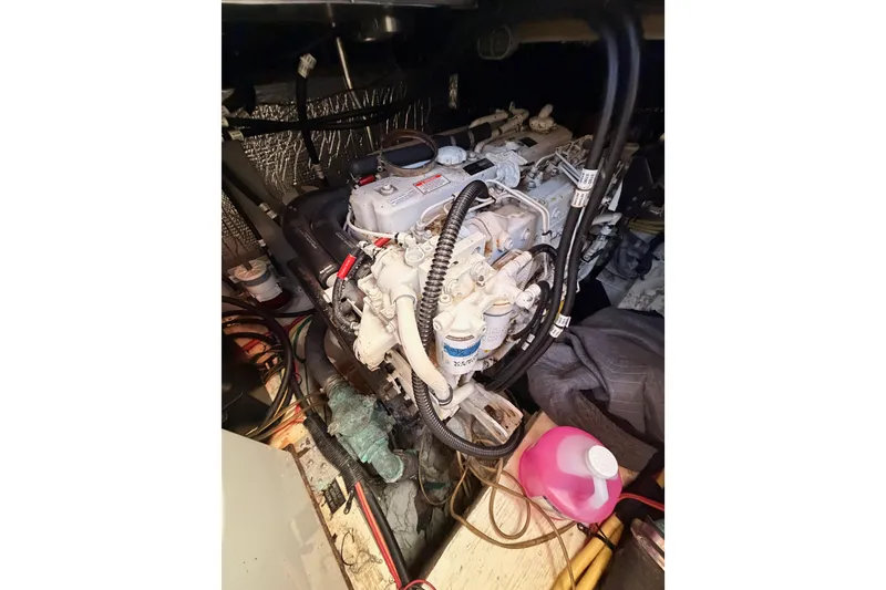 Slide: The Image of Engine compartment of 2005 Cruisers Yachts 405 Express Motoryacht with visible components. - 90