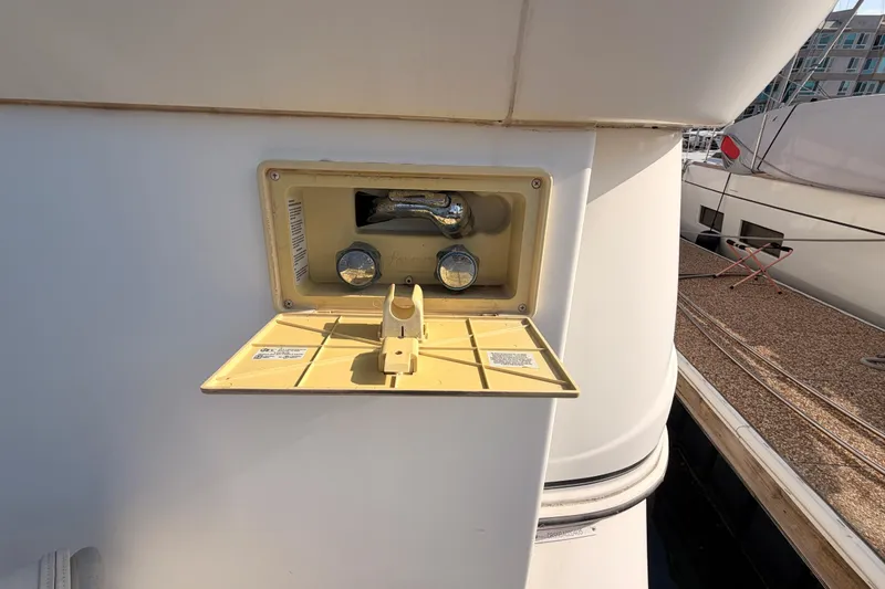 Slide: The Image of 2005 Cruisers Yachts 405 Express Motoryacht outdoor shower fixture on deck. - 10