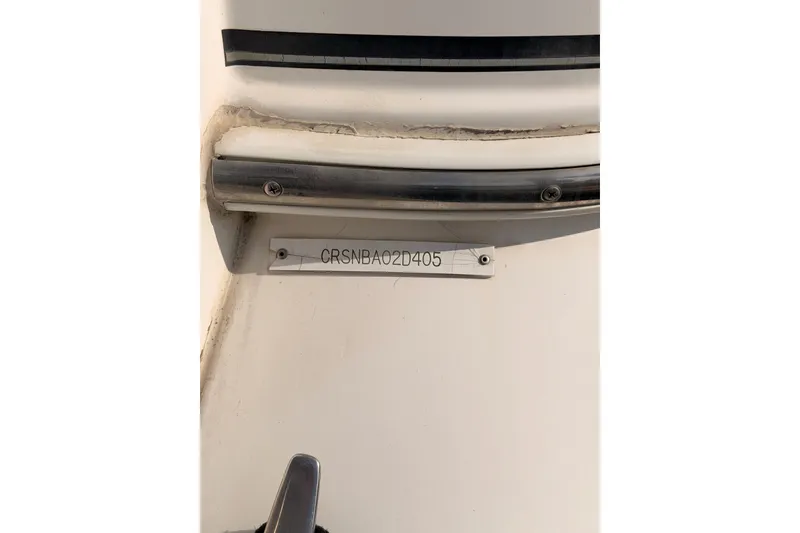 Slide: The Image of 2005 Cruisers Yachts 405 Express Motoryacht hull identification number plate. - 11