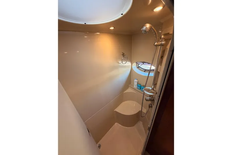 Slide: The Image of Luxurious bathroom in 2005 Cruisers Yachts 405 Express Motoryacht with modern shower amenities. - 60