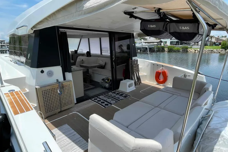 Slide: The Image of Luxurious 2022 Fountaine Pajot MY4.S yacht with spacious deck and modern interior design. - 3