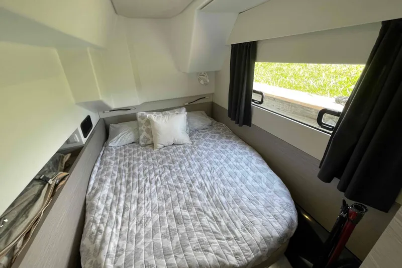 Slide: The Image of Cozy cabin interior of 2022 Fountaine Pajot MY4.S with bed and window view. - 21