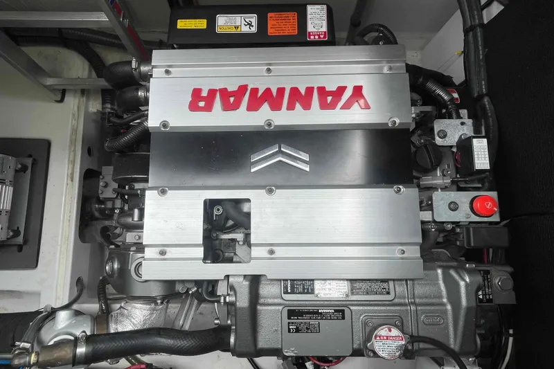 Slide: The Image of Engine compartment of a 2022 Fountaine Pajot MY4.S with Yanmar branding. - 52