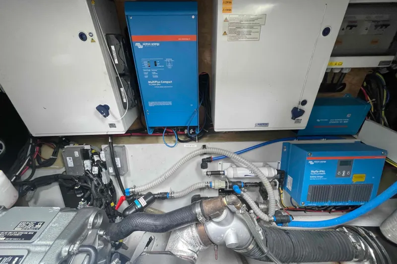 Slide: The Image of Engine room of 2022 Fountaine Pajot MY4.S with electrical systems and components. - 57