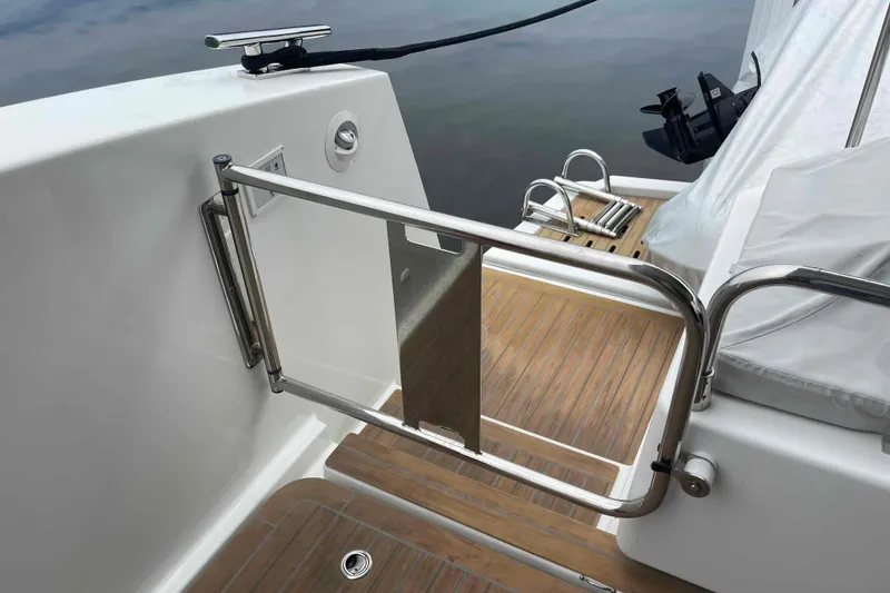 Slide: The Image of Stainless steel gate on 2022 Fountaine Pajot MY4.S yacht with teak deck. - 67