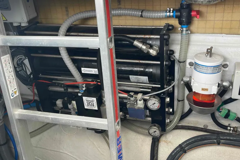 Slide: The Image of Engine room of 2022 Fountaine Pajot MY4.S with fuel filter and piping system. - 53