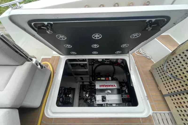 Slide: The Image of Engine compartment of 2022 Fountaine Pajot MY4.S yacht, featuring Yanmar engine. - 50
