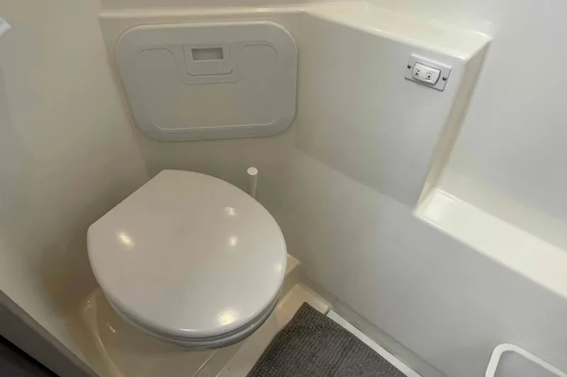 Slide: The Image of Modern bathroom in 2022 Fountaine Pajot MY4.S yacht, featuring sleek toilet design. - 25