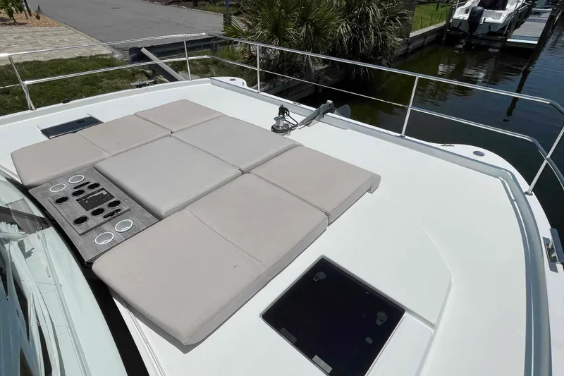 Slide: The Image of 2022 Fountaine Pajot MY4.S yacht with spacious sunbathing area and sleek design. - 19