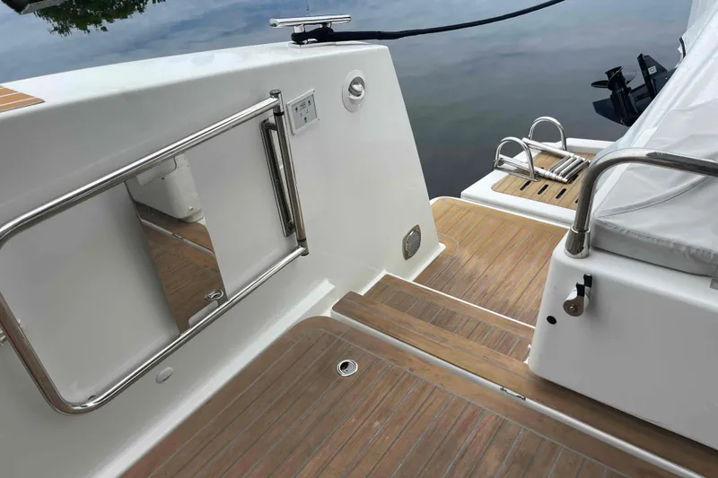 Slide: The Image of 2022 Fountaine Pajot MY4.S yacht deck with teak flooring and stainless steel fittings. - 66