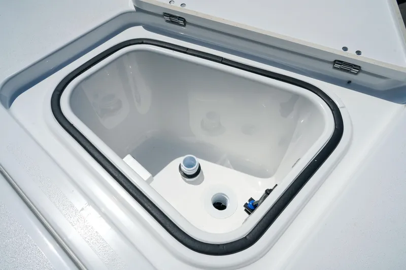 Slide: The Image of Open storage compartment on 2026 Blackfin 262 HB boat, featuring a sleek white interior. - 29