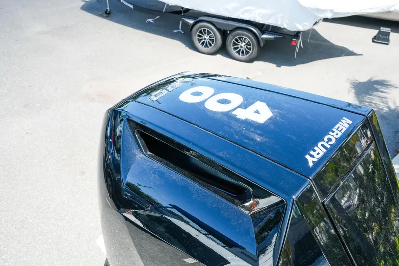 Slide: The Image of Mercury 400 outboard engine on a 2026 Blackfin 262 HB boat, parked on a trailer. - 38