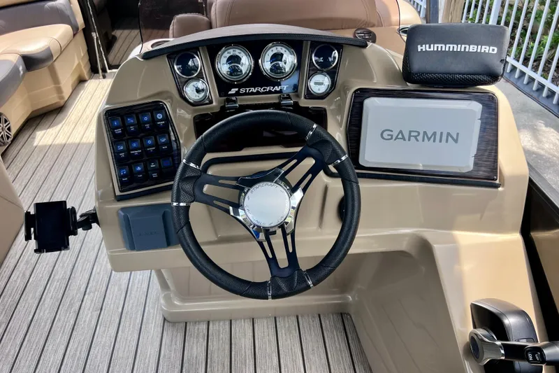 Slide: The Image of 2021 Starcraft SLS 3 boat dashboard with Garmin and Humminbird electronics. - 33