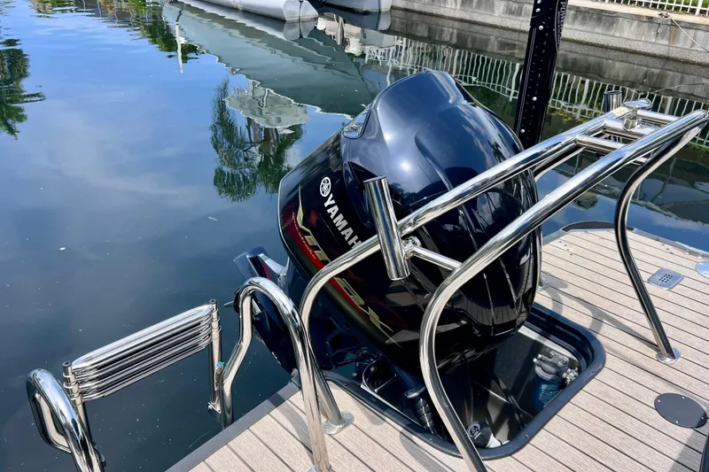 Slide: The Image of 2021 Starcraft SLS 3 boat with Yamaha outboard motor at dockside. - 12
