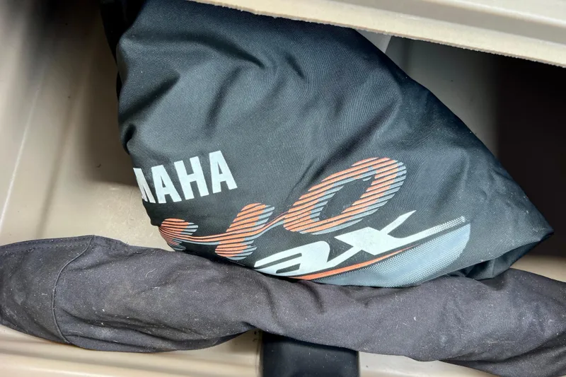 Slide: The Image of Yamaha 40 Max cover inside 2021 Starcraft SLS 3 storage compartment. - 25