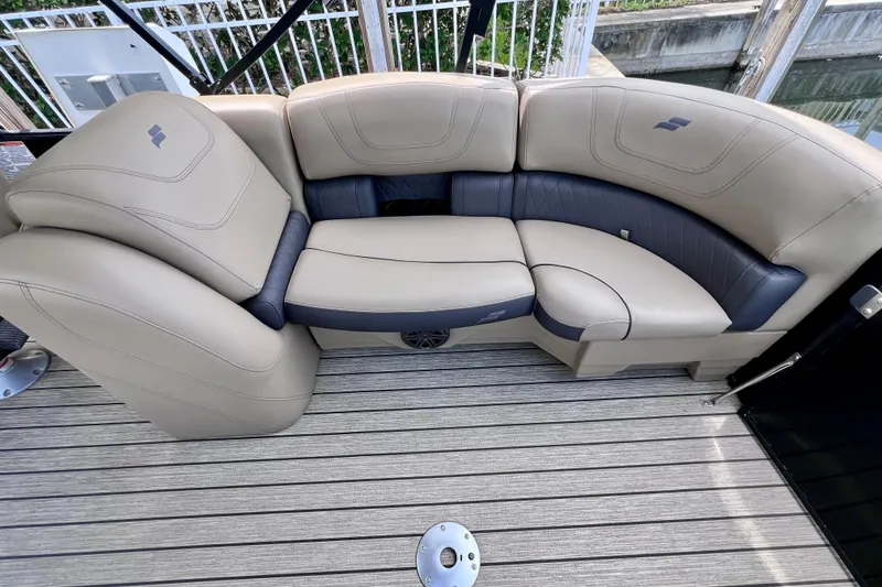 Slide: The Image of Luxurious beige seating on 2021 Starcraft SLS 3 boat deck, featuring sleek design and comfort. - 19