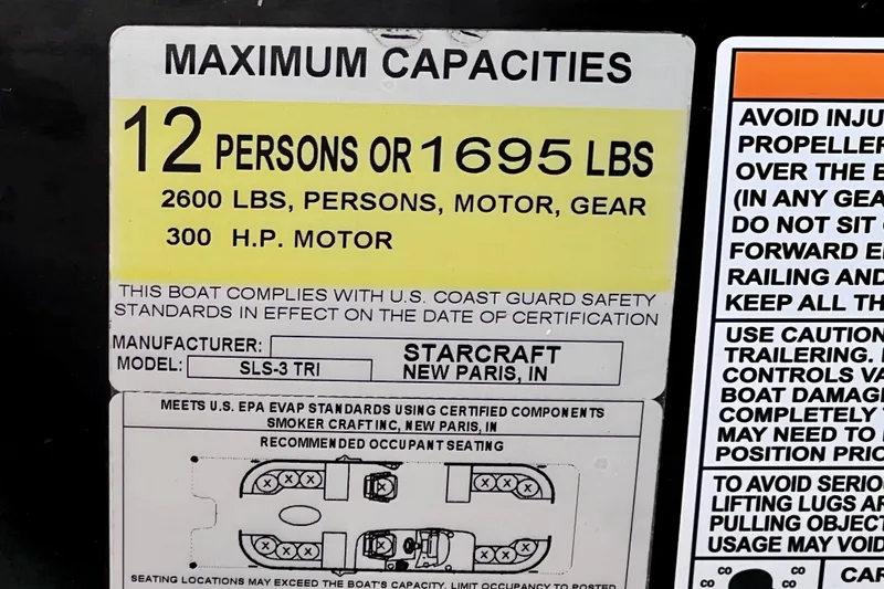 Slide: The Image of Maximum capacity label for 2021 Starcraft SLS 3 boat, 12 persons or 1695 lbs. - 42