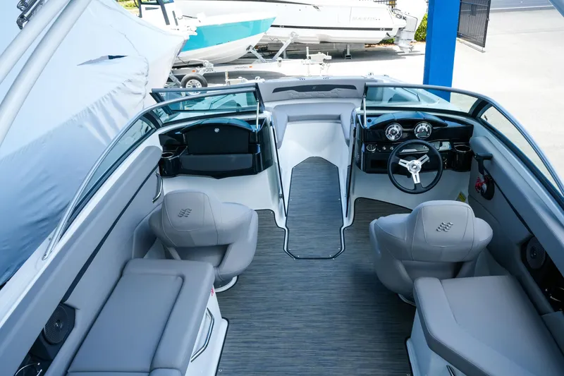 Slide: The Image of Interior of 2027 Four Winns HD2 OB boat, featuring sleek seating and modern dashboard design. - 9