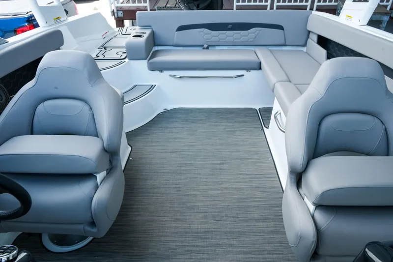 Slide: The Image of Interior of 2027 Four Winns HD2 OB boat with gray seating and modern design. - 28
