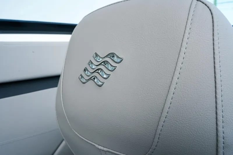 Slide: The Image of 2027 Four Winns HD2 OB boat seat with embossed wave logo. - 12