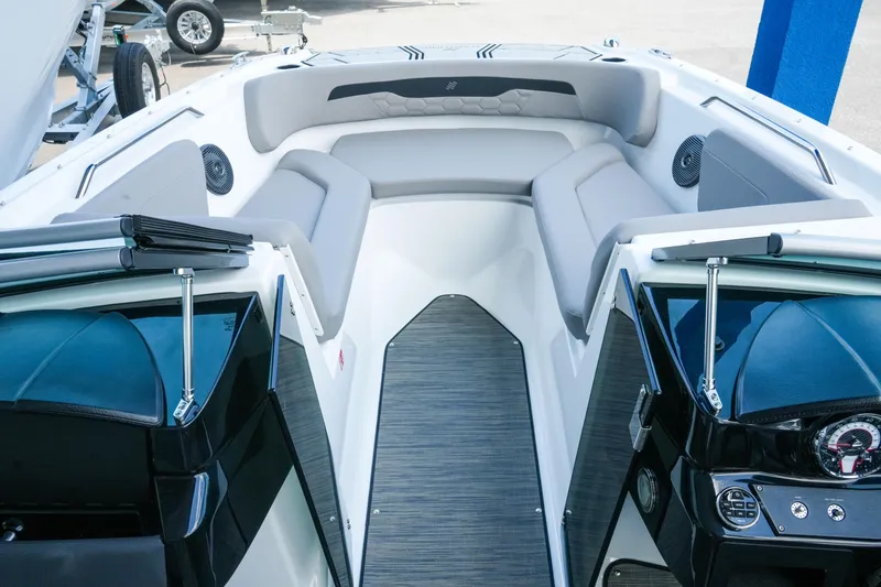 Slide: The Image of 2027 Four Winns HD2 OB boat interior with sleek seating and modern dashboard. - 19