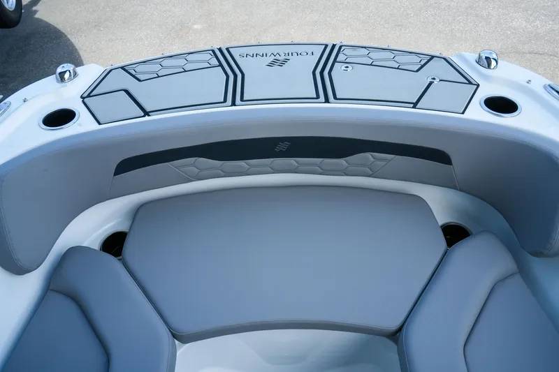 Slide: The Image of 2027 Four Winns HD2 OB boat interior with sleek seating and modern design. - 21