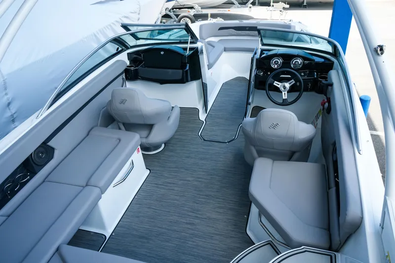 Slide: The Image of 2027 Four Winns HD2 OB boat interior with sleek seating and modern dashboard design. - 7