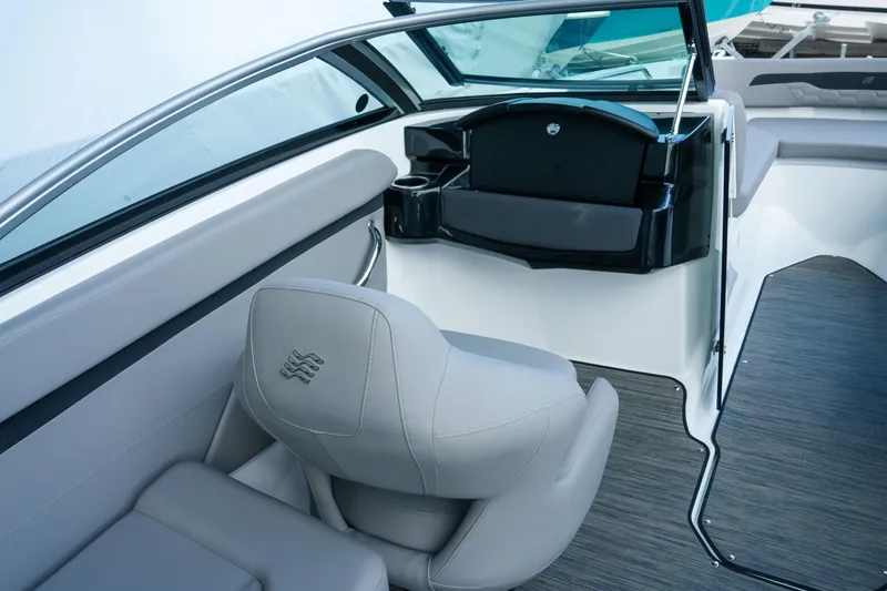 Slide: The Image of 2027 Four Winns HD2 OB boat interior with sleek seating and modern design. - 13