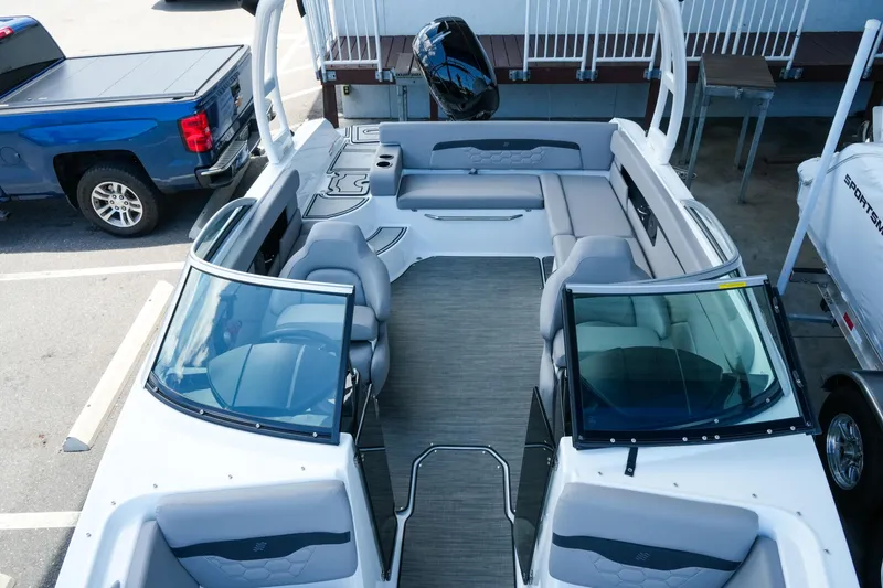 Slide: The Image of 2027 Four Winns HD2 OB boat interior with spacious seating and modern design. - 24