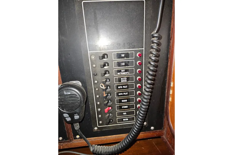 Slide: The Image of Control panel of a 1987 Tayana 52 yacht with communication equipment. - 23
