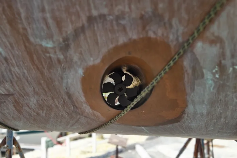 Slide: The Image of Bow thruster on 1987 Tayana 52 sailboat hull, close-up view. - 35