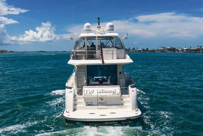 Slide: The Image of Luxury yacht Marquis 65 MY 2005 cruising on clear blue waters. - 4