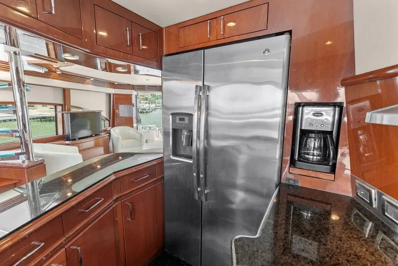 Slide: The Image of Luxurious kitchen interior of 2005 Marquis 65 MY yacht with stainless steel appliances. - 76