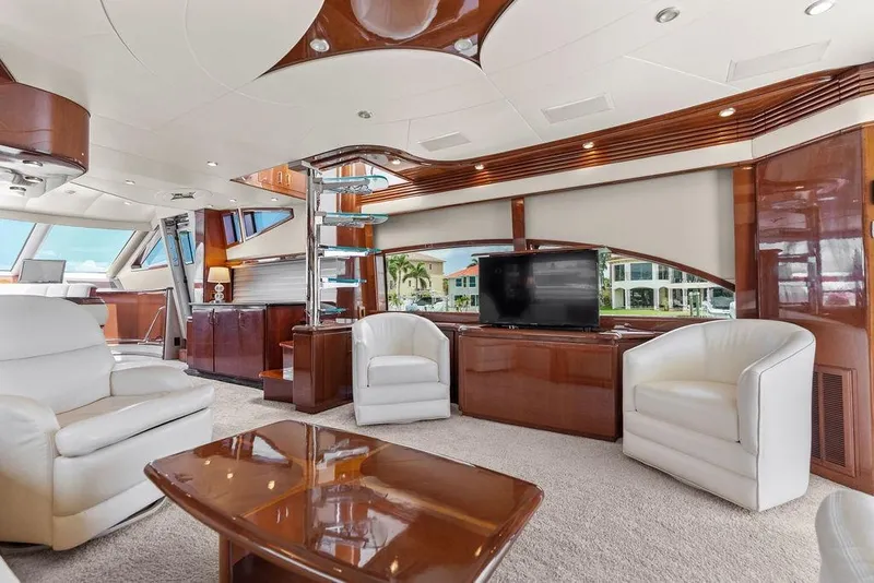 Slide: The Image of Luxurious interior of a 2005 Marquis 65 MY yacht with elegant seating and modern decor. - 80