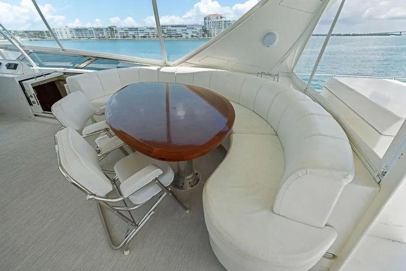 Slide: The Image of Luxurious 2005 Marquis 65 MY yacht interior with elegant seating and ocean view. - 49