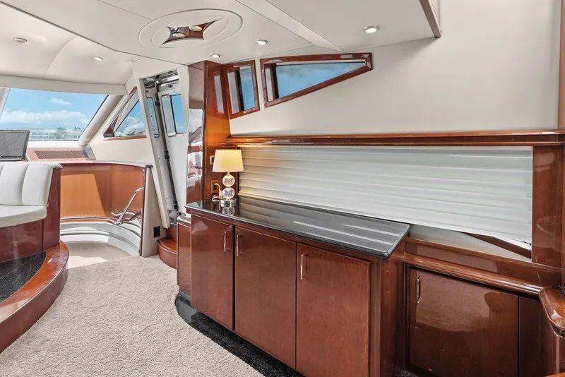 Slide: The Image of Luxurious interior of 2005 Marquis 65 MY yacht with elegant wood finishes and modern design. - 78