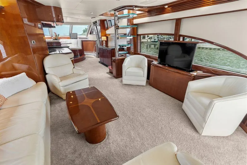 Slide: The Image of Luxurious interior of 2005 Marquis 65 MY yacht with elegant seating and modern decor. - 67