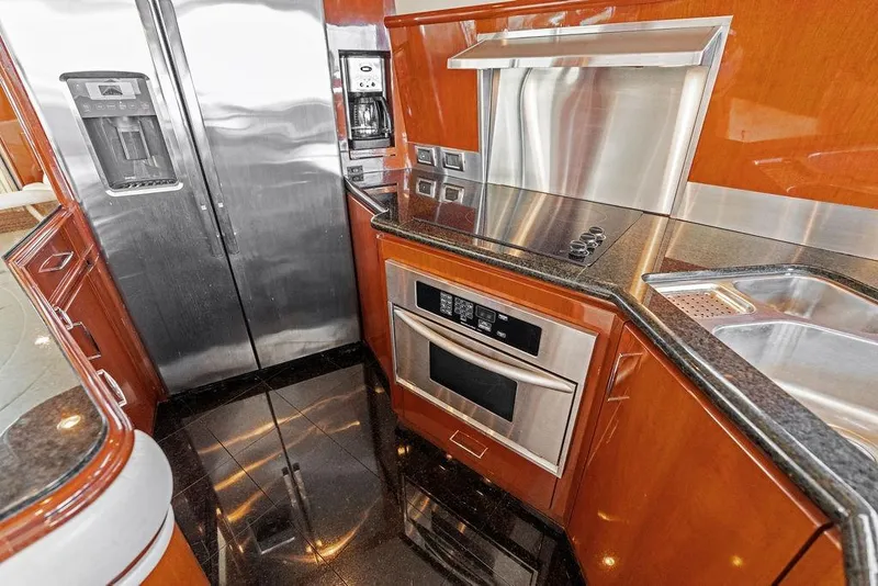 Slide: The Image of Luxurious kitchen in 2005 Marquis 65 MY yacht with stainless steel appliances. - 75