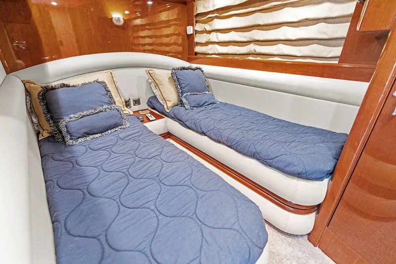 Slide: The Image of Luxurious twin cabin with blue bedding in 2005 Marquis 65 MY yacht. - 81