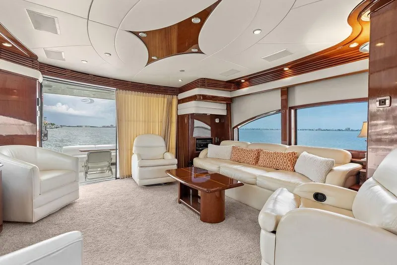 Slide: The Image of Luxurious interior of a 2005 Marquis 65 MY yacht with elegant seating and ocean view. - 69
