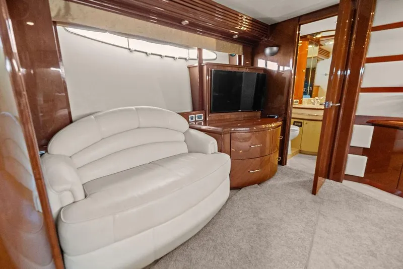 Slide: The Image of Luxurious interior of 2005 Marquis 65 MY yacht with plush seating and modern amenities. - 29