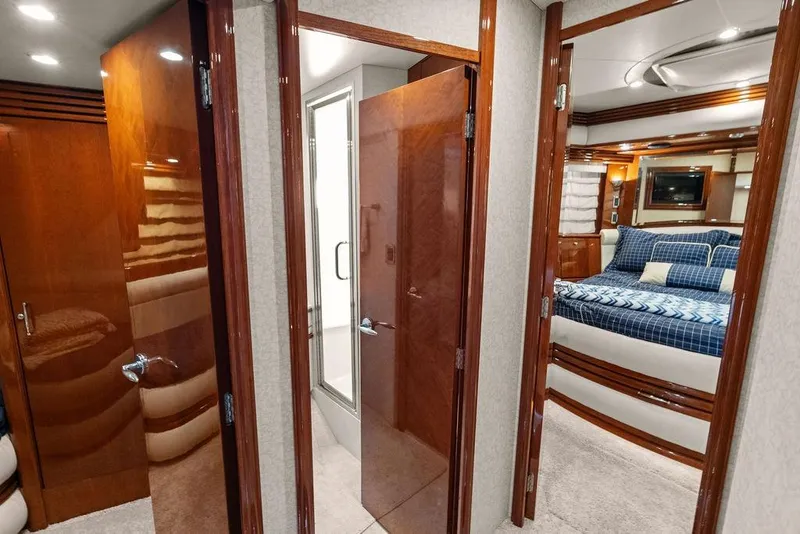 Slide: The Image of Luxurious interior of 2005 Marquis 65 MY yacht with wood finishes and cozy bedroom. - 20