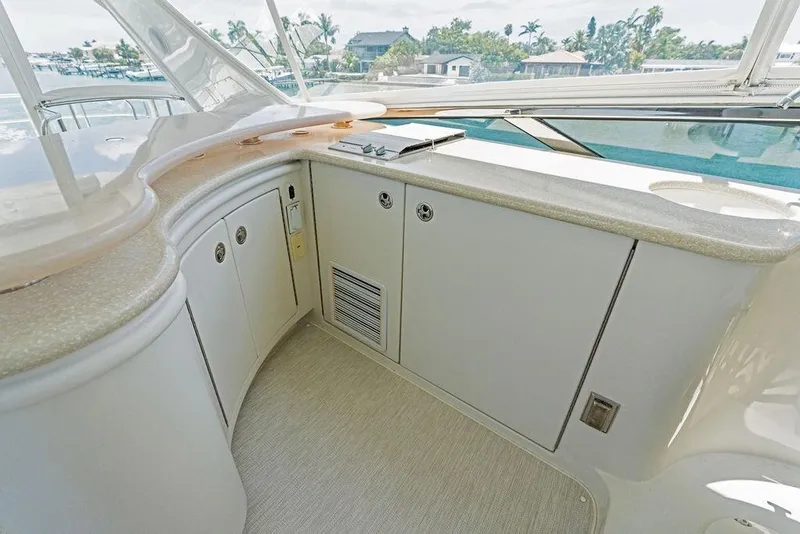 Slide: The Image of Luxurious interior of 2005 Marquis 65 MY yacht with sleek cabinetry and panoramic windows. - 54