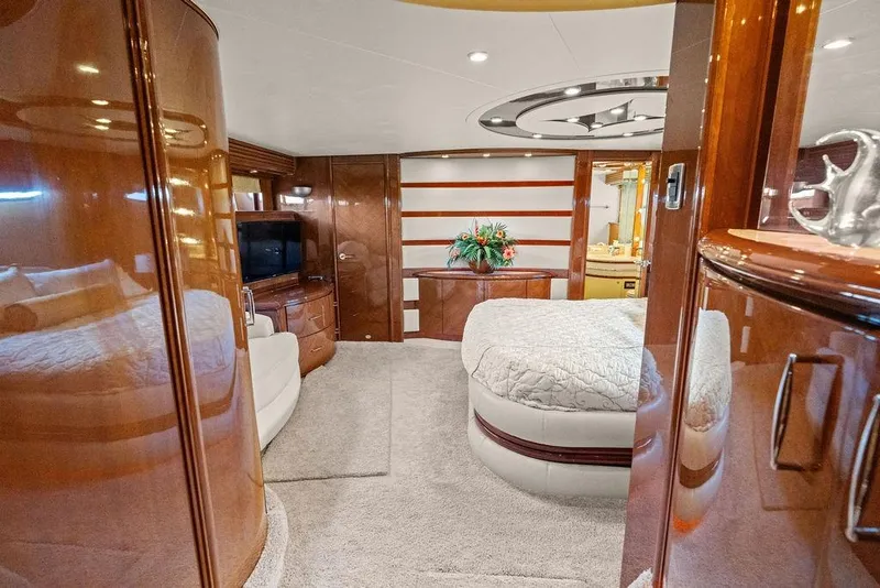 Slide: The Image of Luxurious interior of a 2005 Marquis 65 MY yacht with elegant wood finishes. - 25