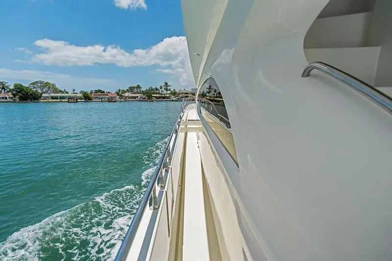 Slide: The Image of Side view of a 2005 Marquis 65 MY yacht cruising on a sunny day. - 40