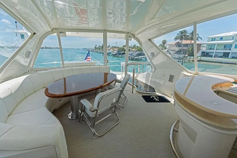 Slide: The Image of Luxurious 2005 Marquis 65 MY yacht interior with elegant seating and ocean view. - 47