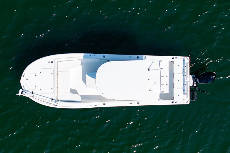Slide: The Image of Aerial view of 2023 Canyon Bay 28h boat on water. - 2